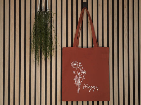 Stoffbeutel in Farbe Rust und Herzkranz-Motiv personalisiert